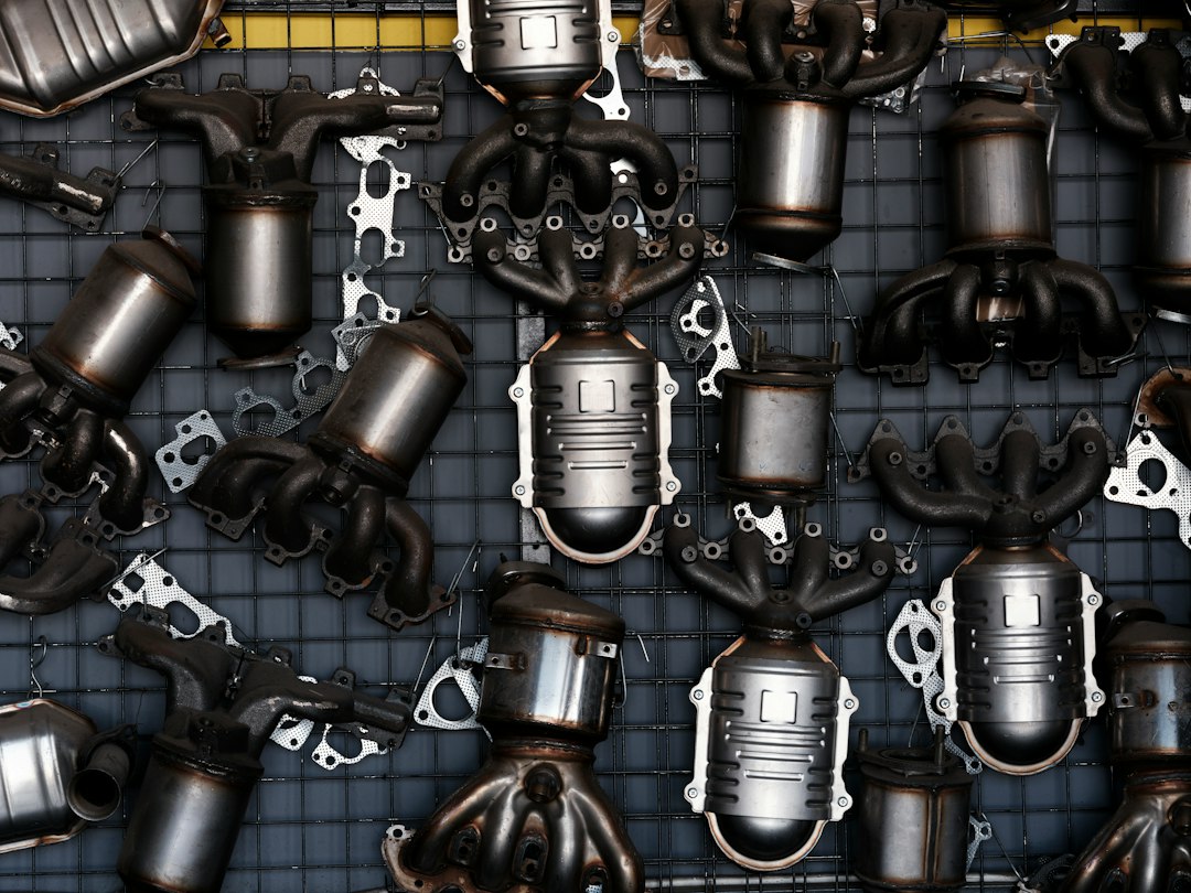 Used vehicle exhaust components in a workshop